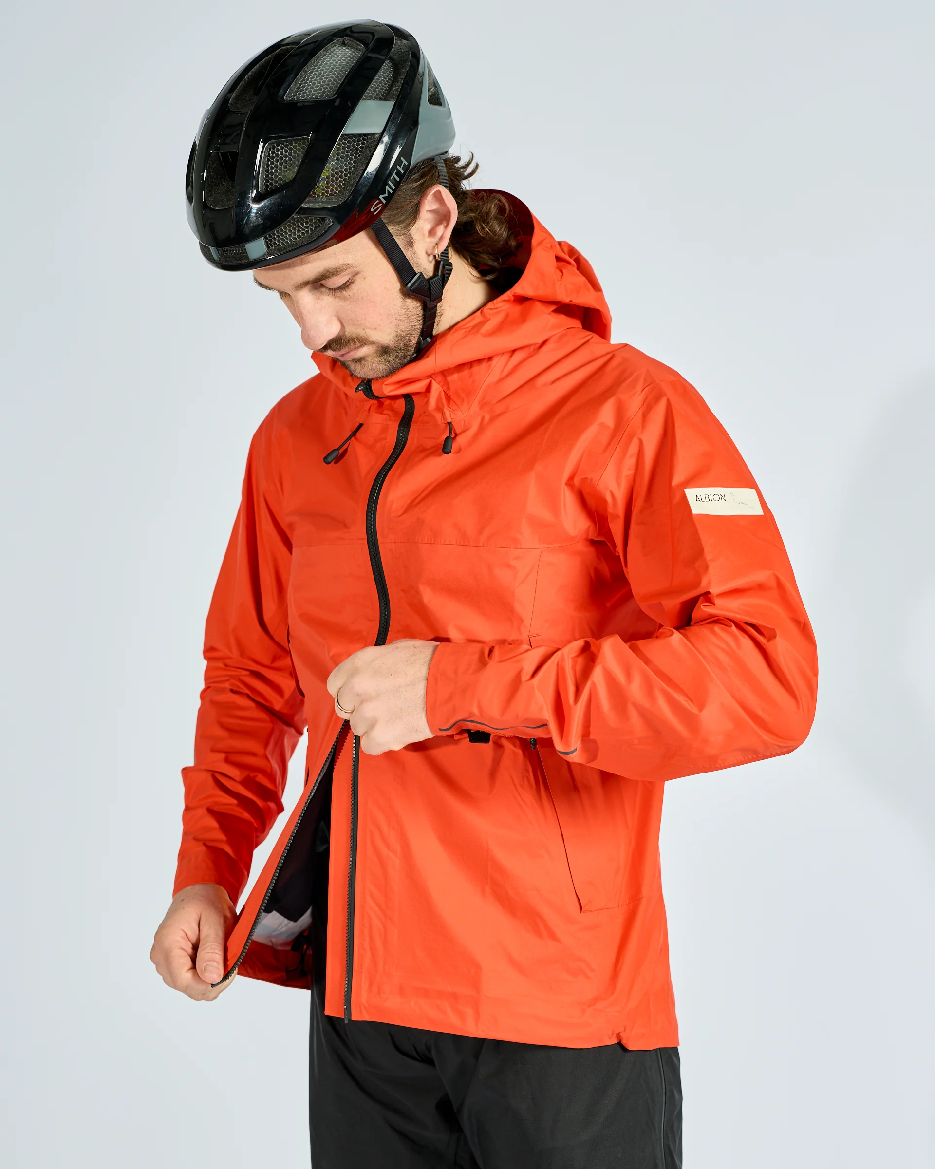 Unisex Zoa Rain Shell (Orange) - Image 7